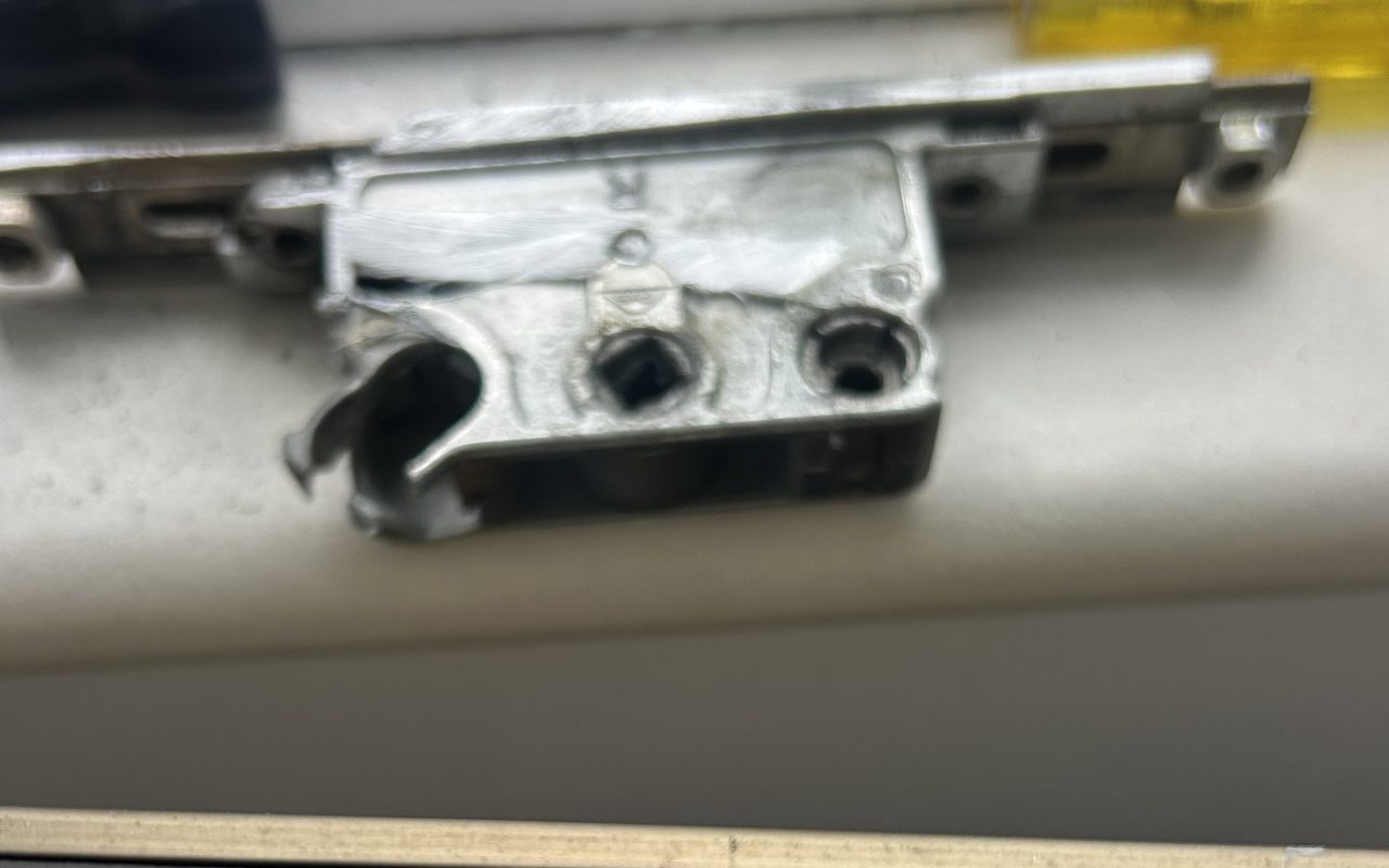 Multipoint window mechanism removed from a UPVC frame during a repair in Essex